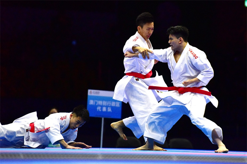 图为澳门队在决赛中奋勇拼搏。澳门特区政府体育局供图