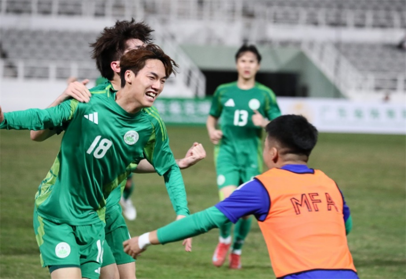 图为澳门队进球后庆祝。（澳门特区体育局供图）